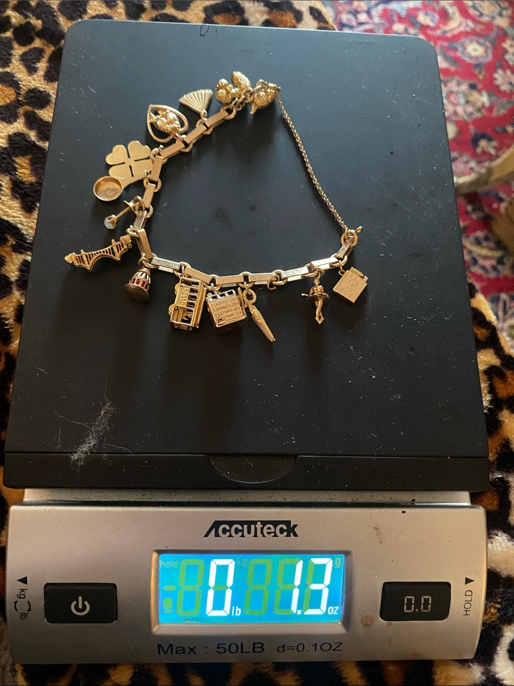 Estate 14kt Gold Multi-Charm Bracelet with Shamrock and moveable charm.
